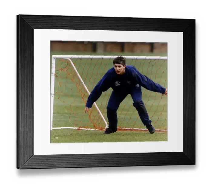 Framed Print : Gary Lineker Football TV Presenter practicing his goalkeeping skills at Spurs Millhill