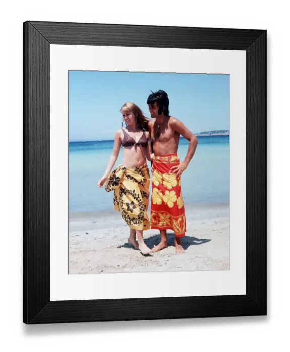 Framed Print : George Best football player and Susan George actress on holiday in Palma Nova Majorca