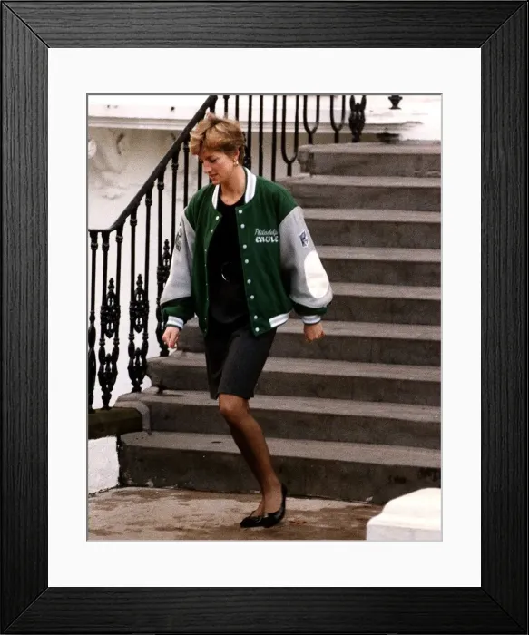 Framed Print : Diana, Princess of Wales, wearing an American football sports jacket as she Wetherby Framed Print : Diana, Princess of Wales, wearing an American football sports jacket as she Wetherby
