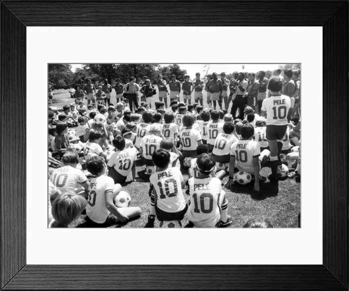 Framed Print : Crowd of young fans wearing Pele T Shirts at his soccer school in the USA August Framed Print : Crowd of young fans wearing Pele T Shirts at his soccer school in the USA August