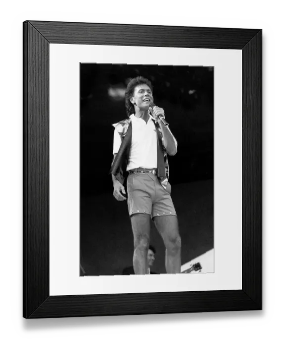 Framed Print : Cliff Richard singer and actor in concert on stage in Wembley. June 1989