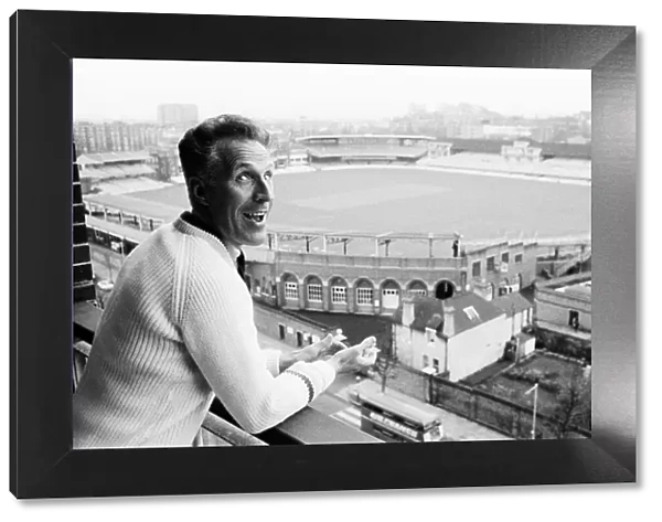 Bruce Forsythe Entertainer, July 1965 looking over the balcony of his flat which