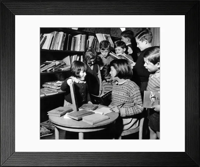 Framed Print : 10 yr old girl librarian. Shirley Needham, whose mother is a pantomime star has been made Framed Print : 10 yr old girl librarian. Shirley Needham, whose mother is a pantomime star has been made