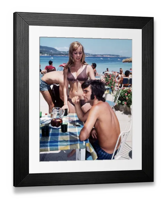 Framed Print : George Best football player and Susan George actress on holiday in Palma Nova Majorca