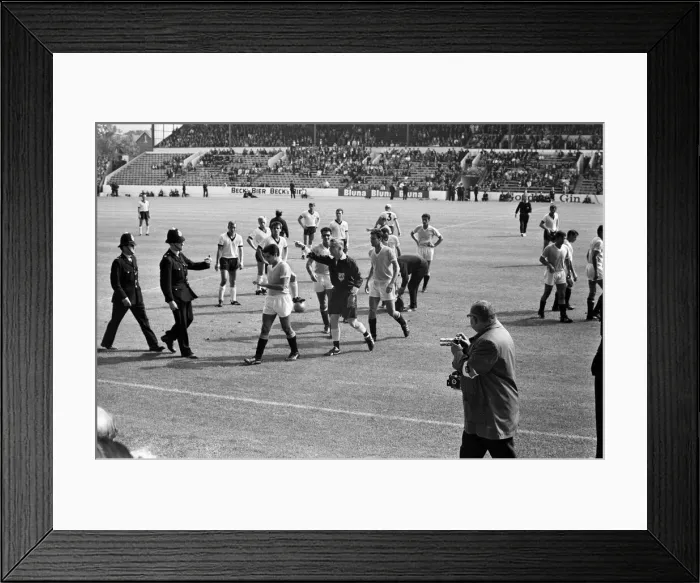 Framed Print : World Cup Football 1966 West Germany v Uruguay Referee Jim Finney calls for Framed Print : World Cup Football 1966 West Germany v Uruguay Referee Jim Finney calls for