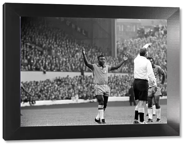 Pele July 1966 raises his hands as the referee awards a free kick in the Scotland v