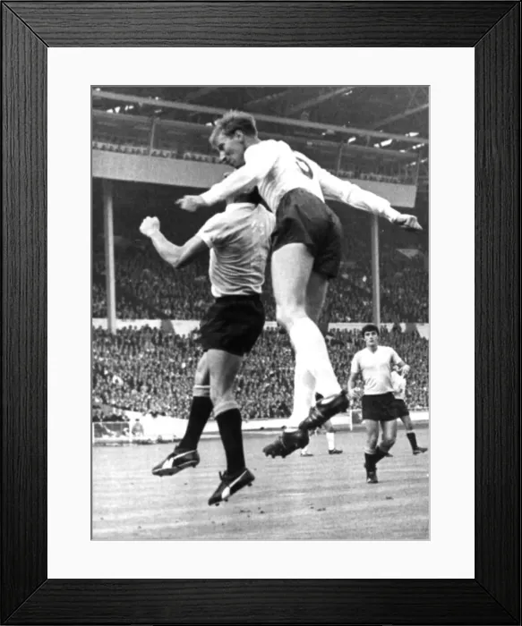 Framed Print : Jack Charlton heading duel with Troche of Uraguay opening match of the World Cup Framed Print : Jack Charlton heading duel with Troche of Uraguay opening match of the World Cup