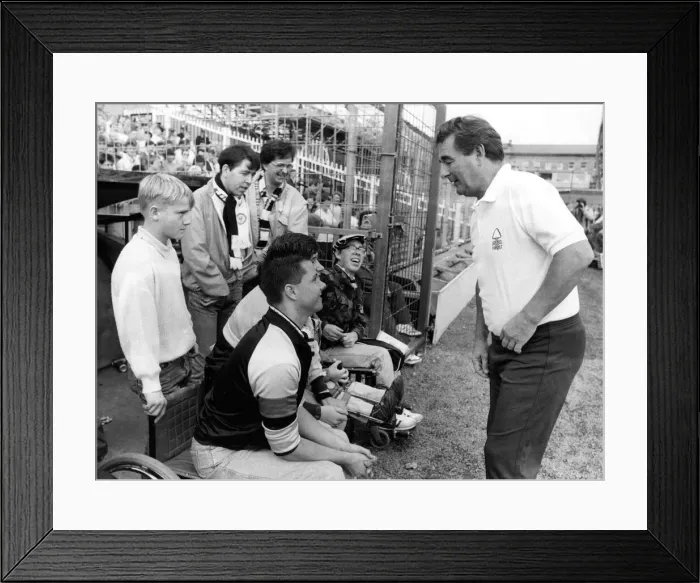 Framed Print : Nottingham Forest manager Brian Clough chats to Newcastle fans before the game 29 August Framed Print : Nottingham Forest manager Brian Clough chats to Newcastle fans before the game 29 August