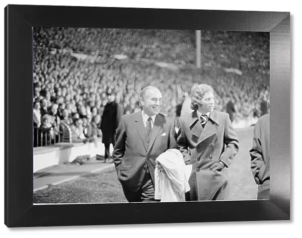 Sir Alf Ramsey seen here sharing a joke with Alan Ball before the start of Endland