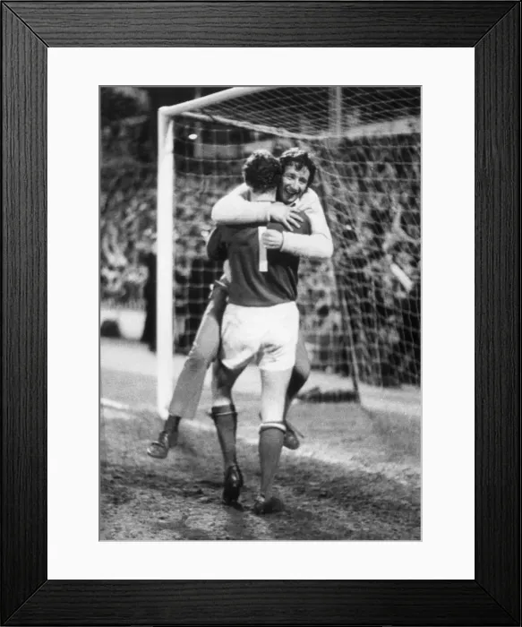Framed Print : Arsenl win the League championship, an excited fan hugs Bob Wilson. 4th May 1971 Framed Print : Arsenl win the League championship, an excited fan hugs Bob Wilson. 4th May 1971
