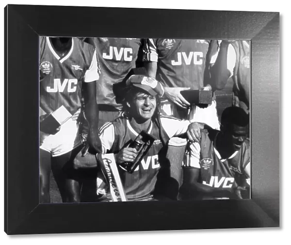 Charlie Nicholas of Arsenal celebrates his double in the Littlewood