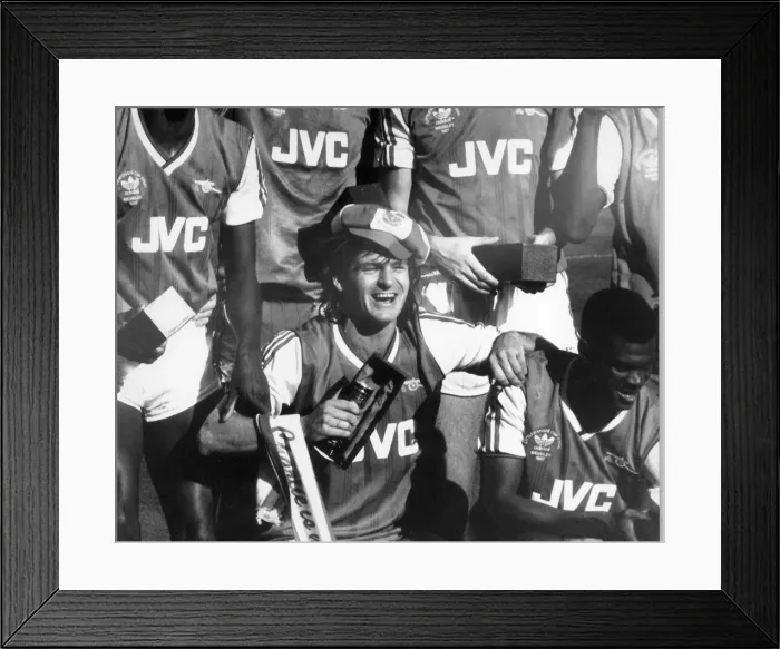 Framed Print : Charlie Nicholas of Arsenal celebrates his double in the Littlewood Framed Print : Charlie Nicholas of Arsenal celebrates his double in the Littlewood