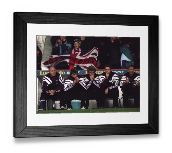 Framed Print : Kevin Keegan Newcastle United Football Manager and his staff sit on the bench in