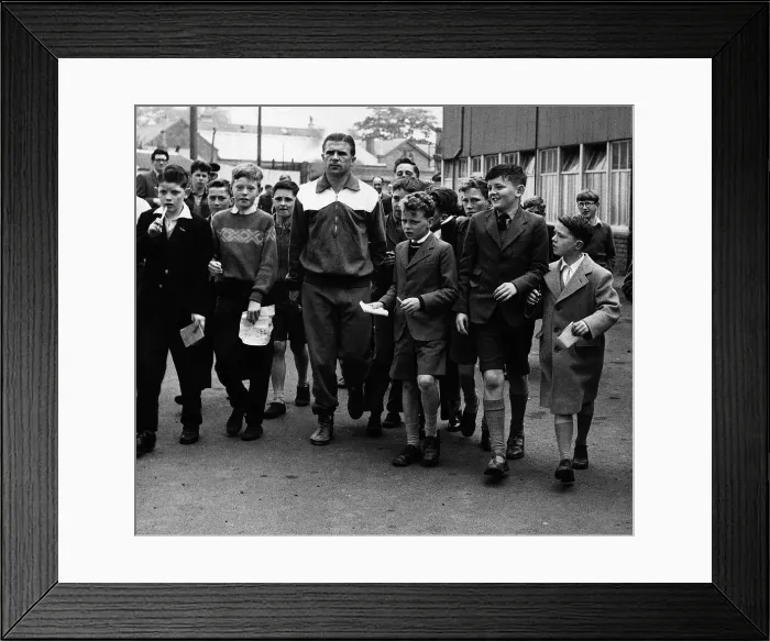 Framed Print : Ferenc Puskas Real Madrid footballer is mobbed by schoolchildren after leaving training Framed Print : Ferenc Puskas Real Madrid footballer is mobbed by schoolchildren after leaving training