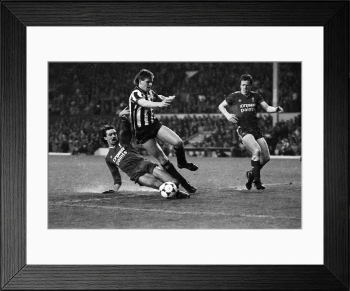 Framed Print : Liverpool v. Newcastle United. December 1985 Paul Gascoigne breaks through the Liverpool Framed Print : Liverpool v. Newcastle United. December 1985 Paul Gascoigne breaks through the Liverpool