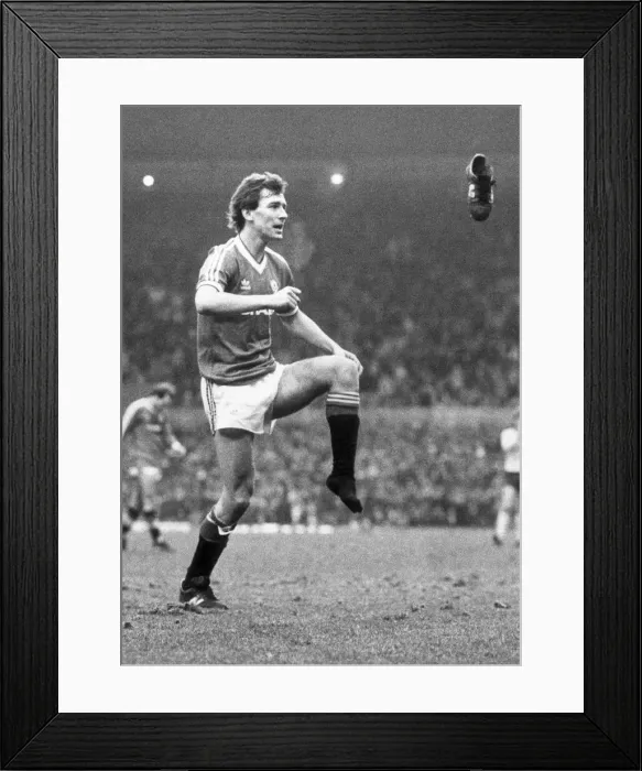 Framed Print : Manchester United v. Arsenal. OPS Bryan Robson loses his boot after scoring Framed Print : Manchester United v. Arsenal. OPS Bryan Robson loses his boot after scoring