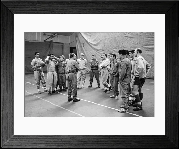 Framed Print : New England manager Alf Ramsey talks to his squad of players at the RAF Arena in Stanmore Framed Print : New England manager Alf Ramsey talks to his squad of players at the RAF Arena in Stanmore