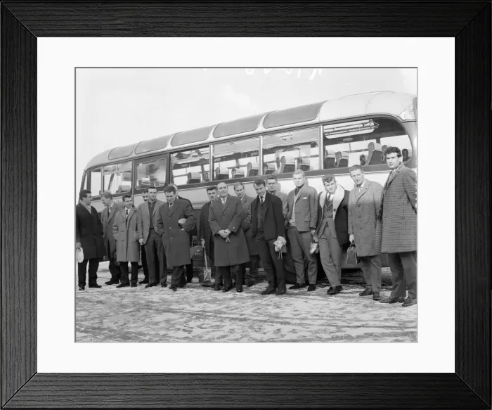 Framed Print : New England manager Alf Ramsey stands in front of the team bus with his squad of players Framed Print : New England manager Alf Ramsey stands in front of the team bus with his squad of players