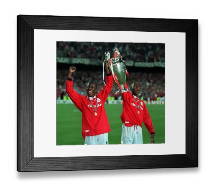 Framed Print : Andy Cole and Dwight Yorke Manchester United players with trophy after