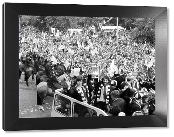 Spurs homecoming after winning the FA Cup. Players with the trophy on the bus