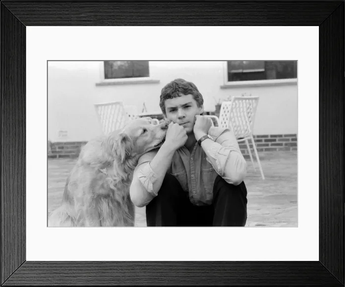 Framed Print : Spurs fan David Baker with his dog Pepper who ate his tickets for the FA Cup