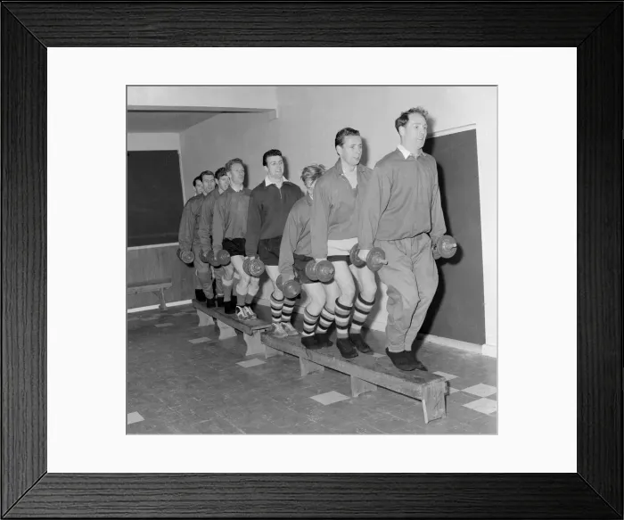 Framed Print : Plymouth Argyle football team carrying weights as they take part in training exercises Framed Print : Plymouth Argyle football team carrying weights as they take part in training exercises