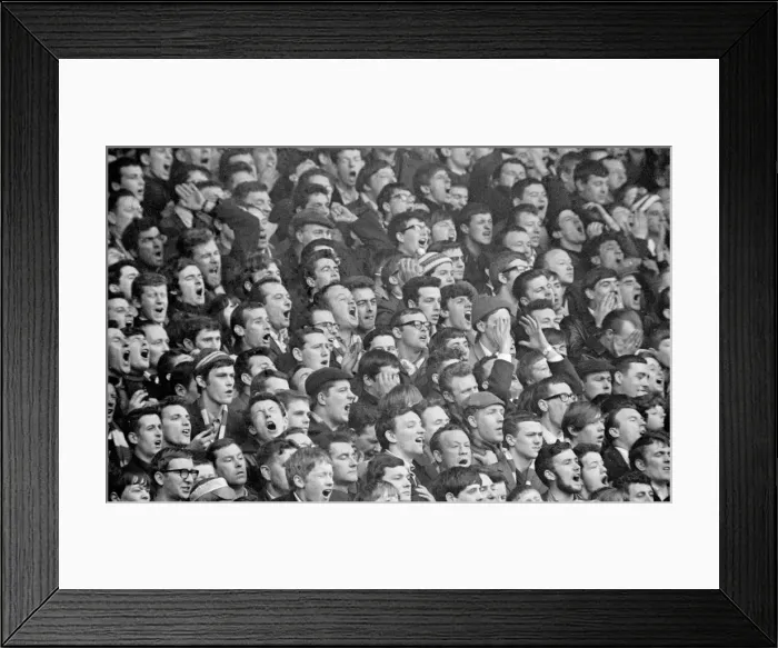 Framed Print : Liverpool supporter look on in disbelief as a shot on goal goes wide during the match Framed Print : Liverpool supporter look on in disbelief as a shot on goal goes wide during the match