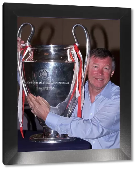 Alex Ferguson holds the European Cup May 1999 the day after Manchester
