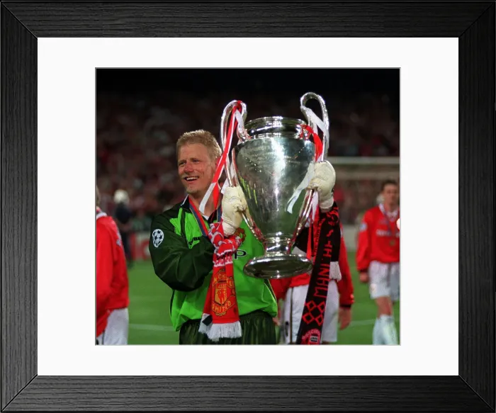 Framed Print : Manchester Uniteds Peter Schmeichel May 1999 holds the European Cup as Framed Print : Manchester Uniteds Peter Schmeichel May 1999 holds the European Cup as