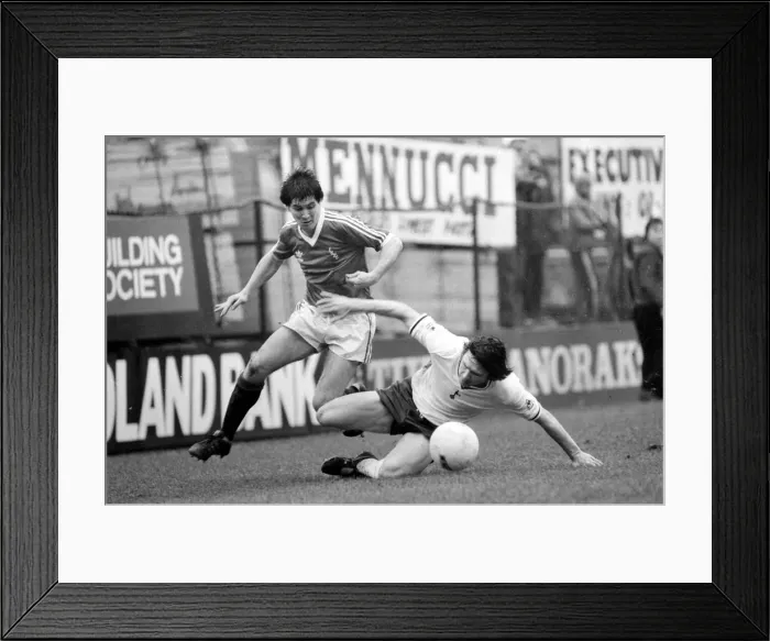 Framed Print : FA Cup 6th Round. Tottenham Hotspur 2 v. Exeter City 0. Steve Perryman slides Framed Print : FA Cup 6th Round. Tottenham Hotspur 2 v. Exeter City 0. Steve Perryman slides