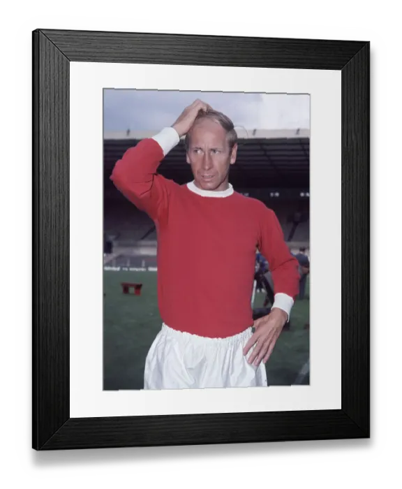 Framed Print : Manchester United footballer Bobby Charlton at Old Trafford. Circa 1966