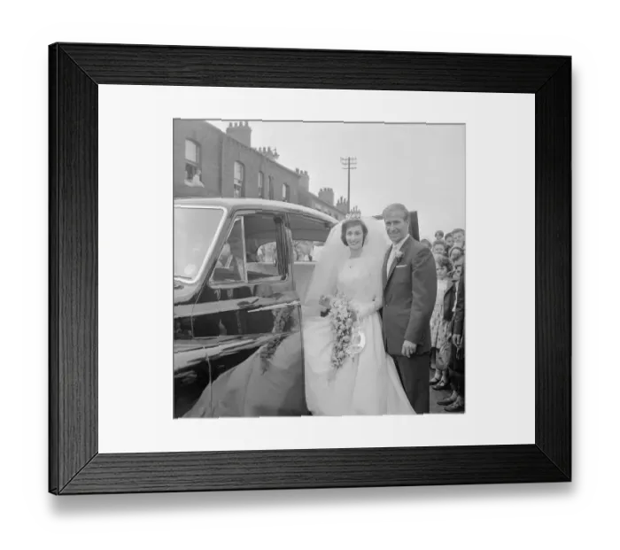 Framed Print : Manchester United and England footballer Bobby Charlton with his bride