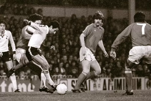 Tottenhams Ossie Ardiles beats the Altrincham defence during their FA Cup 3rd round game