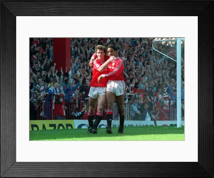Framed Print : Manchester United footballer Mark Hugfhes celebrates a goal with teammate Paul Ince