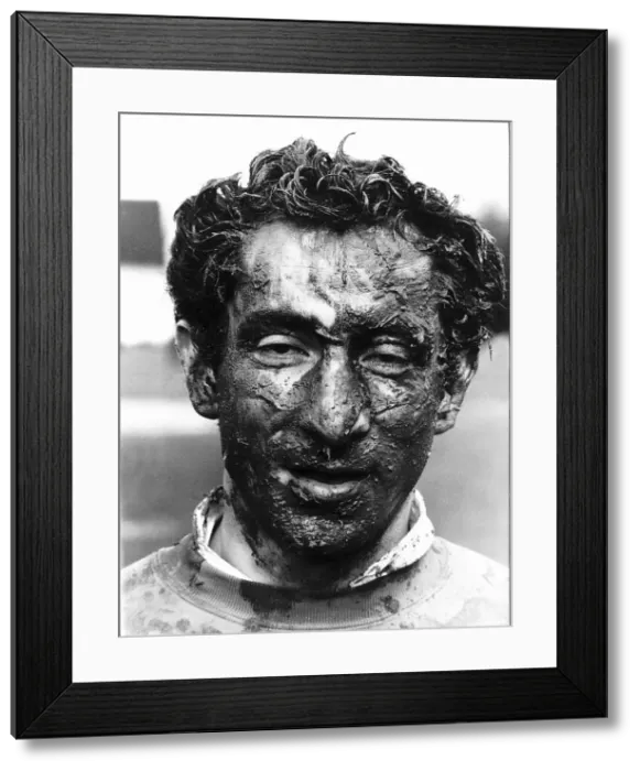Framed Print : Ossie Ardiles football player covered in mud. March 1982