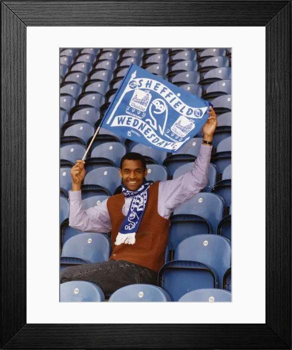 Framed Print : Mark Bright footballer for Sheffield Wednesday sits in seats and waves a flag Framed Print : Mark Bright footballer for Sheffield Wednesday sits in seats and waves a flag