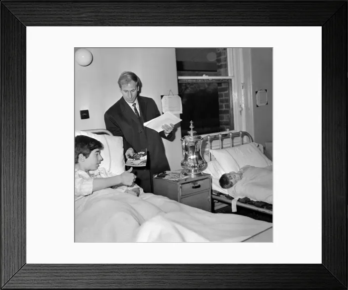 Framed Print : manchester United footballer Bobby Charlton signs an autograph for 8 year Billy Vickers Framed Print : manchester United footballer Bobby Charlton signs an autograph for 8 year Billy Vickers