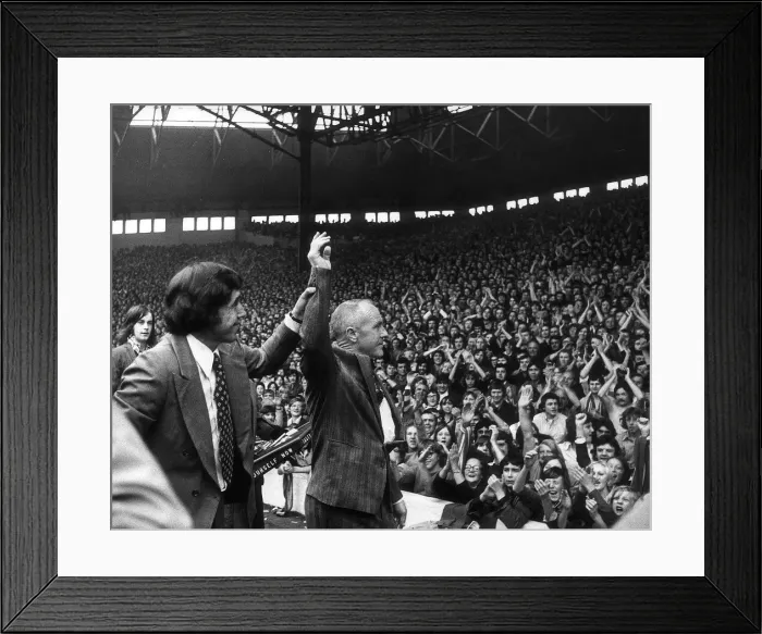 Framed Print : Gordan Banks is led round in front of the Kop by Bill Shankly before the game between