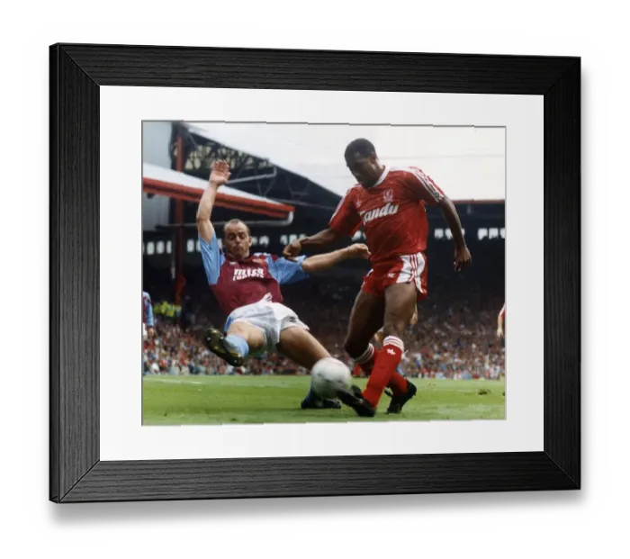 Framed Print : John Barnes (R) playing for Liverpool against Aston Villa 1990