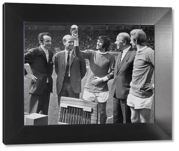 Manchester United footballer George Best receives the 1969 European Footballer of