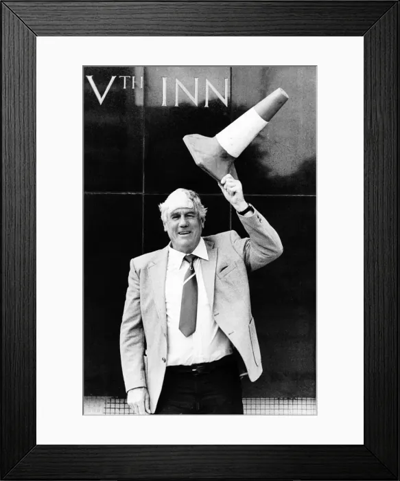 Framed Print : Len Shackleton Sunderland, Newcastle and England footballer holds a traffic cone above Framed Print : Len Shackleton Sunderland, Newcastle and England footballer holds a traffic cone above