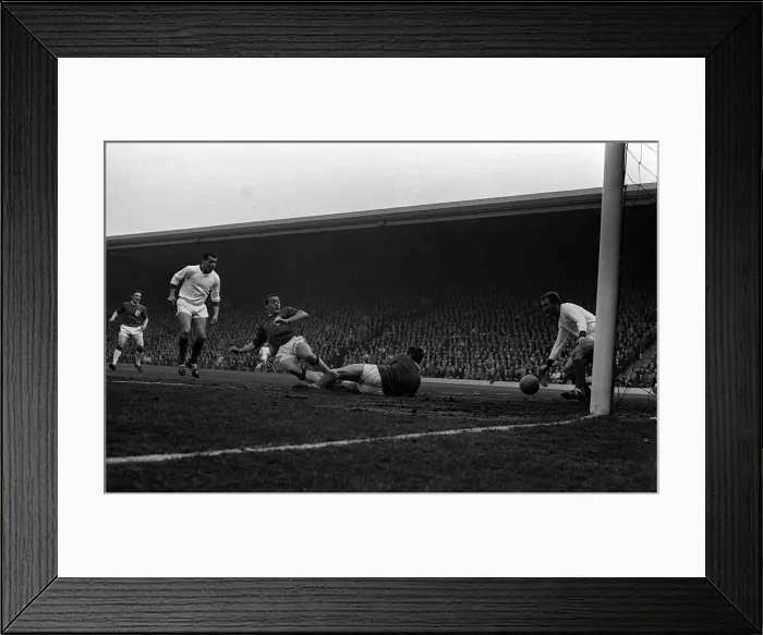 Framed Print : Ian St John of Liverpool scores past keeper Furnell in the game against Arsenal that gave