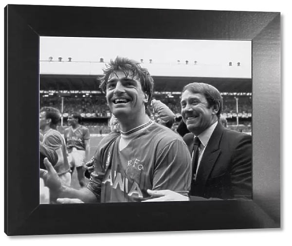 Everton manager Howard Kendall and Kevin Ratcliffe acknowledge the applause of the fans
