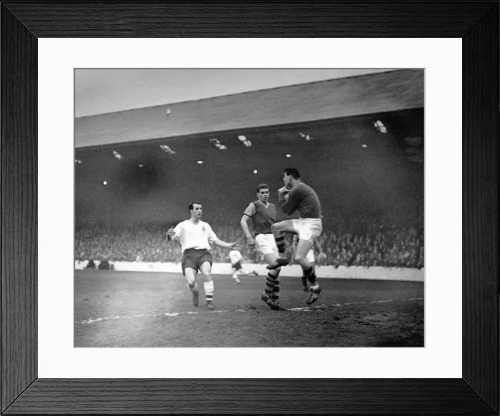 Framed Print : Burnley v Bolton 16th December 1959 Burbley goal keeper Adam Blacklaw heaves a Framed Print : Burnley v Bolton 16th December 1959 Burbley goal keeper Adam Blacklaw heaves a