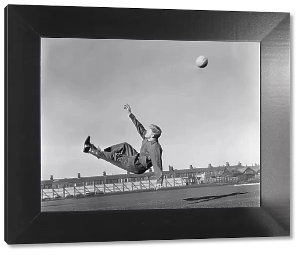 Burnleys Ray Pointer attempts an over head kick during training 14  /  02  /  1962