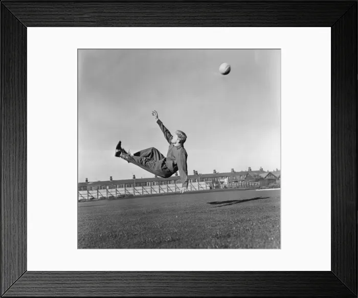 Framed Print : Burnleys Ray Pointer attempts an over head kick during training 14 / 02 / 1962 Framed Print : Burnleys Ray Pointer attempts an over head kick during training 14 / 02 / 1962