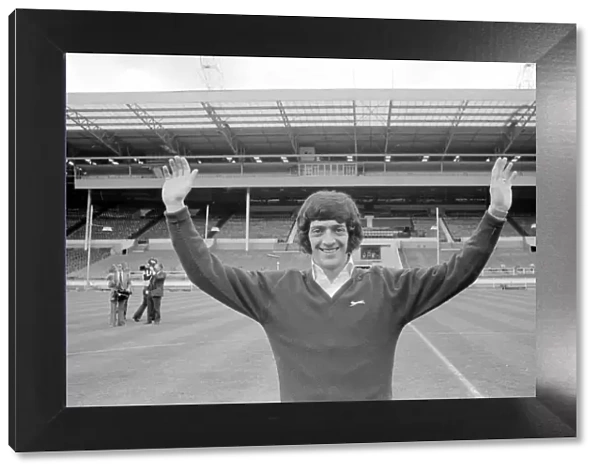 Newcastle United footballer Terry Hibbitt gives the Geordie goal salute as he stands