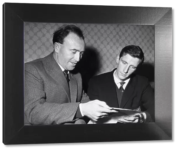Tony Waddington (left) Stoke City Manager with new signing Dennis Viollet after he