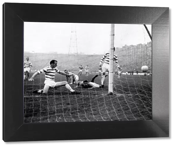 Celtic left back Willie O Neill clears an Alex Smith shot from the goal line