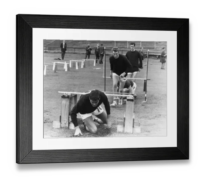 Framed Print : Celtic football players going through assault course during pre season preparations July Framed Print : Celtic football players going through assault course during pre season preparations July